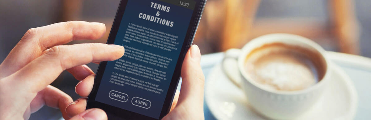 Phone user reviewing terms and conditions